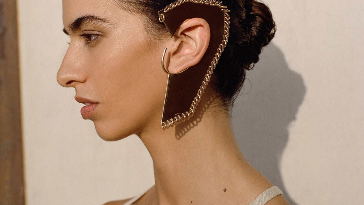 Model wearing the Geometric Pierced ear cuff by Noritamy